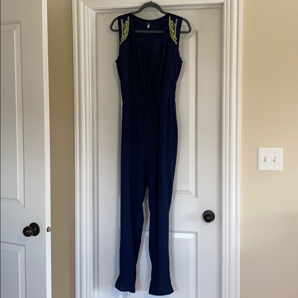Navy jumpsuit with neon detail